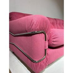 Pink corduroy sofa by Piazzesi with a metallic frame. This piece is attributed to the mentioned designer/maker. It has no attribution mark and no   official proof of authenticity,   however it is well documented in design history. I take full responsibility for any authenticity         issues arising from misattribution Small Pink Sofa, Vampire House, Corduroy Sofa, Downtown Loft, Art Deco Sofa, Pink Couch, Downtown Lofts, Metallic Frame, Pink Sofa