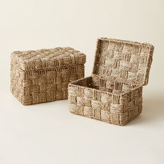 two woven baskets sitting next to each other