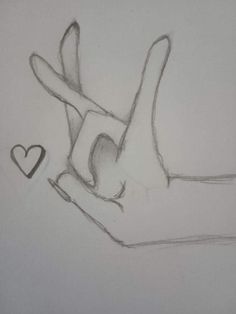 a pencil drawing of a hand holding a heart