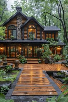 a large wooden house surrounded by trees and plants