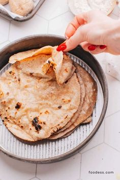 Roti is a soft and light Indian flatbread made with whole wheat flour (atta). Perfect for pairing with dal and curries, these rotis puff up beautifully on a cast iron skillet. Very easy to make, they are ideal for everyday meals, picnics, potluck and special occasions. Use them to scoop up vegetarian or meat curries, sauces or for wraps/rolls. Get the full roti recipe and video tutorial on my blog!