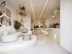 the interior of a modern office with white furniture