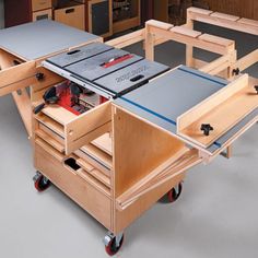 a workbench with drawers and tools in it