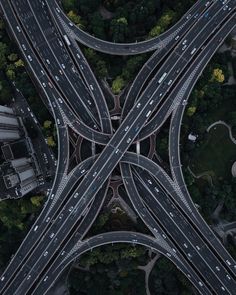 an overhead view of multiple roads in the city