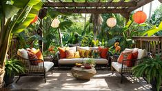 an outdoor patio with lots of plants and furniture