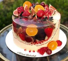 there is a cake with fruit on it