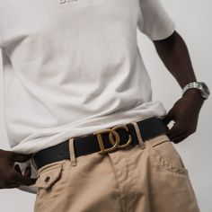 A smooth leather belt with our signature DC buckle. Black leather Brass hardware One size fits all (Adjustable) Draco Collection buckle Buckle: 3"W x 2"H 1.5" belt width Can be worn as a hip or waist belt Mens Belt, Brass Hardware, Mens Belts, Waist Belt, Smooth Leather, Leather Belt, One Size Fits All, Snug Fit, Black Leather