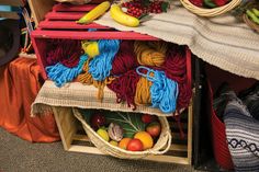 several baskets and fruits are stacked on top of each other