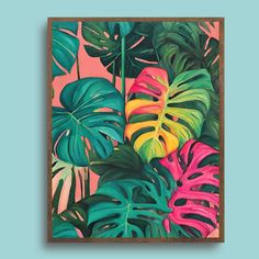 a painting of tropical leaves on a pink background with green and yellow colors in the frame