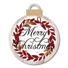 a wooden ornament with the words merry christmas on it