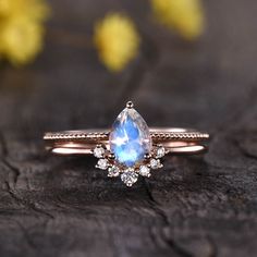 https://bbbgem.com/product/solitaire-rainbow-pear-moonstone-diamond-engagement-ring-set/?ref=iykwuu3z1v #engagementring #anniversarygift #solitaire Black Opal Engagement Ring, Rainbow Moonstone Engagement Ring, Moonstone Engagement Ring Rose Gold, Opal Engagement Ring Set, Moonstone Engagement Ring Set, Vintage Gold Engagement Rings, Rose Gold Plated Ring, Antique Engagement Ring, Moonstone Engagement