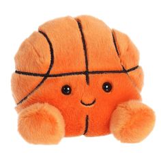 an orange stuffed animal with a basketball on it's face