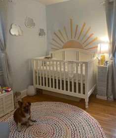 a small dog sitting in the middle of a room with a crib and dresser