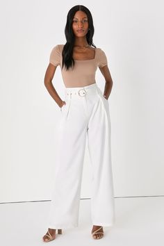 From the conference room to dinner with besties, strut your stuff in the Lulus Confident Vibes White Belted Wide-Leg Trouser Pants! Theses chic pants have a woven fabric construction that shapes a high-waisted fit, top clasp and hidden zip-fly, and a matching detachable belt (with round, shiny gold buckle). Relaxed, wide-cut pants, with light seaming from the waist, feature diagonal pockets before ending at ankle-length hems. Fit: This garment fits true to size. Length: Floor length. Size medium Tops On White Pants, Must Have Bottoms For Women, Outfit Pantalon Blanc, White Baggy Pants Outfit, White Dress Pants Outfit, Business Party Outfit, Dressy Casual Outfits For Women, White Belt Outfit, White Wide Leg Pants Outfit