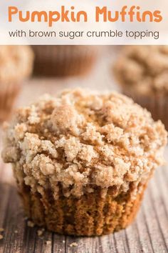 pumpkin muffins with brown sugar crumble topping on a wooden surface and text overlay