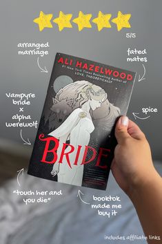 a person holding up a book in front of their face with the words bride written on it