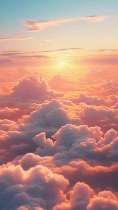 the sky is filled with clouds as the sun sets in the distance behind it,