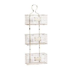 three tiered wire basket with handles on each side and two baskets hanging from the top