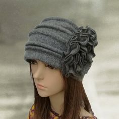 This  gray  felted beanie is super warm.This hat is very comfortable and easy to wear.  You can put it on with classic and casual style clothing, so this beautiful cap is very universal. Composition: 100% wool It is a very stylish women's beanie that is going to keep you warm in cold days, yet you will look amazing.  This headpiece is a timeless classic and great for all ages. Boiled wool is thin, you can fold the hat and slip in into your bag.One size to fit average woman's head.CARE: Hand wash Womens Winter Hats, Womens Beanie, Warm Hats, Wool Hats, Felt Wool, Warm Winter Hats, Wool Berets, Altering Clothes, Wool Winter