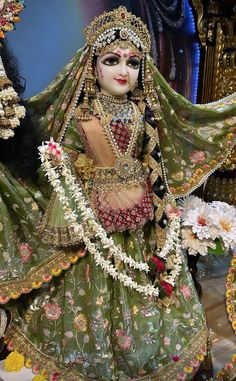 a woman dressed in an elaborately decorated costume