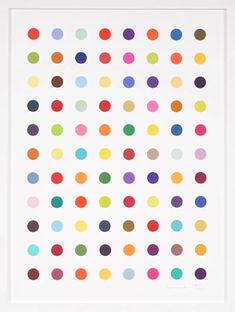 a white framed print with multicolored dots on it's sides and bottom half