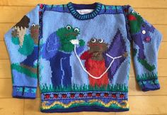 two knitted sweaters are shown on the website