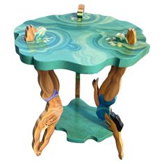 a wooden table with two people floating in the water on it's legs and feet