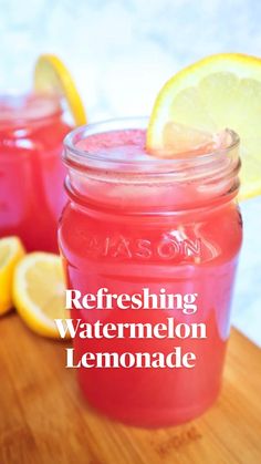 two mason jars filled with watermelon lemonade