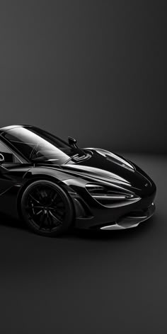 a black sports car on a dark background