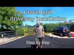 a man walking across a parking lot next to a black car with the words gravel grid driveway installation step by step