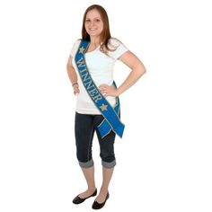 Shout out to the world that you are an achiever! Make your graduation day extra special wearing this decorative winner sash. The lovely sash perfectly complementing the outfit will surely help you to steal the limelight!. Product Features: Blue and gold decorative winner satin sash accessory. Each satiny, blue sash is trimmed in gold with the word Winner and 2 stars printed in gold on the front. A perfect gift for your sports fanatic or the recent graduate. . Dimensions: 33" long x 4" wide. Mate Blue Sash, Satin Sash, Graduation Day, Blue And Gold, Star Print, Shout Out, Product Features, Halloween Costumes, Perfect Gift