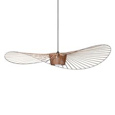 a bird shaped light fixture hanging from the ceiling, with wire attached to it's wings