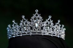 This stunning Tiara Crown is crafted from tarnish resistant zinc alloy and intricately decorated with crystals to create an elegant look ideal for any special occasion, including weddings, quinceañeras, birthdays, pageants and more. **WEARING YOUR CROWN OR TIARA** Most pieces are adjustable by carefully bending and separating the ends to desired fit. Loops are featured in the design for securing to hair with bobby pins or clips **SHIPPING** All orders are sent within 24 hours from Florida, USA. Tiara Silver, Silver Tiara Aesthetic, Princess Silver Crown, Queen Crown Silver, Luxury Silver Crown Headpiece, Crystal Tiaras, Bridal Crown, Bridal Tiara, Tiaras And Crowns