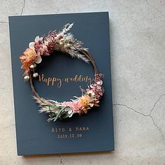 a happy wedding card with flowers on it