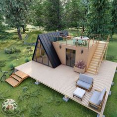 an aerial view of a house in the middle of a field with stairs leading up to it