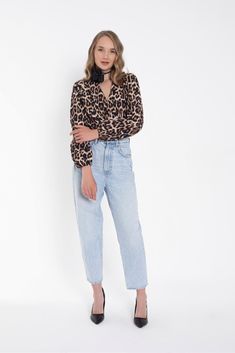 Elevate your wardrobe with this stunning vintage-style leopard print blouse, perfect for adding a touch of wild sophistication to any outfit. This blouse features: Bold Leopard Print: A timeless and trendy pattern that never goes out of style, making a fierce statement wherever you go. Elegant Black Choker: A unique black choker adorned with a delicate flower, adding a touch of elegance and charm to the overall look. Comfortable Fit: Made from soft, breathable fabric that ensures all-day comfort Choker Outfit Casual, Leopard Print Blouse Outfit, Leopard Print Shirt Outfit, Print Blouse Outfit, Things To Thrift, Choker Outfit, Ideas For Outfits