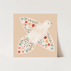 a card with a white bird on it's wings and flowers around its neck