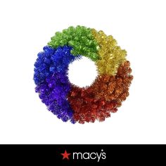 a colorful wreath made out of tinsels on a white background with the words macy's written below it