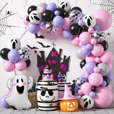 a halloween themed party with balloons and decorations