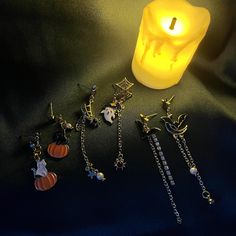 👻Get into the Halloween spirit with these playful and spooky earrings! Available in three unique designs: - A mischievous cat lounging atop a pumpkin - A haunting ghost with intricate spider web   details - A sleek bat ready to take flight 👻Each pair is crafted with fine attention to detail, making them the perfect accessory for any Halloween celebration. Lightweight and comfortable, these earrings add a touch of festive fun to your outfit. Perfect for parties, trick-or-treating, or just embra Web Detail, Bat Earrings, Ghost Earrings, Pumpkin Earrings, Halloween Earrings, Dangly Earrings, Cat Earrings, Halloween Celebration, Halloween Jewelry