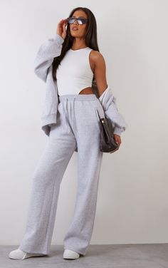 Add some comfy vibes to your new season wardrobe with these tall ash grey straight leg joggers. Made from an ash grey hue material with a straight leg fit, an elasticated waistband and drawstring detailing, what's not to love Team these joggers with a bodysuit, a matching hue hoodie, your go-to accessories and fresh kicks for a look that is perfect for those chilled off-duty days and beyond.   Length approx 91.5cm/36 (Based on a sample size S)   Model wears size S   Model Height - 5ft 10 Outfits With Joggers, Straight Leg Sweatpants Outfit, Joggers Outfit Women, Straight Leg Joggers, Grey Tracksuit, Comfy Vibes, Rp Characters, Chic Shirts, Joggers Outfit