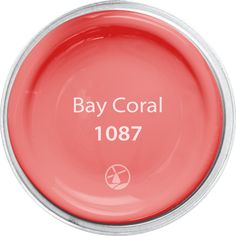 a red bowl with the words bay coral on it