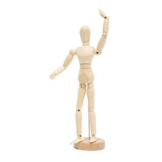 a wooden mannequin holding his arms up