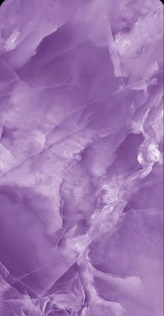 an abstract purple background with white swirls