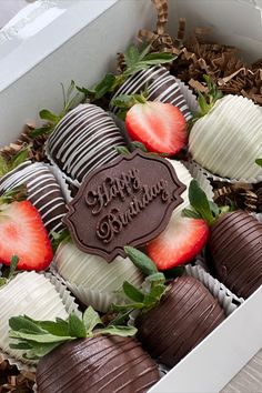 a box filled with chocolate covered strawberries