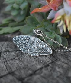 "Sterling Silver Large Moth Necklace details: -Solid .925 sterling silver -Charm measures 30mm x 21mm -Three chain designs to choose from: Bead/Satellite Bead/or Oval Cable chain -Spring Ring clasp closure -Layers easily with other necklaces! Find our other necklaces here: https://www.etsy.com/shop/AWildViolet?ref=seller-platform-mcnav&section_id=35401315 Looking for a last minute or unique Christmas gift? Visit our \"READY TO SHIP\" section here, ships out in one business day https://www.etsy.c Bohemian Butterfly Sterling Silver Necklace, Bohemian Sterling Silver Butterfly Necklace, Nickel-free Sterling Silver Butterfly Necklace, Silver Butterfly Nature-inspired Jewelry, Handmade Silver Butterfly Necklace, Unique Handmade Silver Butterfly Necklace, Spiritual Silver Butterfly Necklace, Nature-inspired Sterling Silver Butterfly Jewelry, Unique Sterling Silver Butterfly Necklace