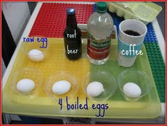 eggs are laid out on a lego tray with coffee, root egg, and boiled eggs