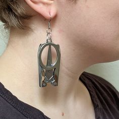 If you've ever needed a pair of scissors to quickly clip a loose thread, remove a tag, or turn a post-it note into paper dolls, these are the perfect earrings for you! Awesome industrial look stainless steel drop earrings easily unfold into fully functional 3-3/4 inch scissors. I love these! They are a bit heavy, but wearable at about .7 ounces per earring, and about 3-1/4 inches long. NOTE: These are functional, metal, sharp, pointy scissors. Not a toy. Not appropriate for children. Functional Earrings, Scissor Earrings, Pinterest Wishlist, Big Statement Earrings, Cool Earrings, Heavy Earrings, Post It Note, Unusual Earrings, Earring Holder