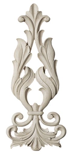 an ornate white wood carving on a white background