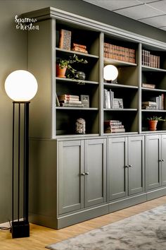 a living room filled with lots of furniture and bookshelves on top of each other